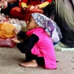 Girl awaiting langar, Amritsar